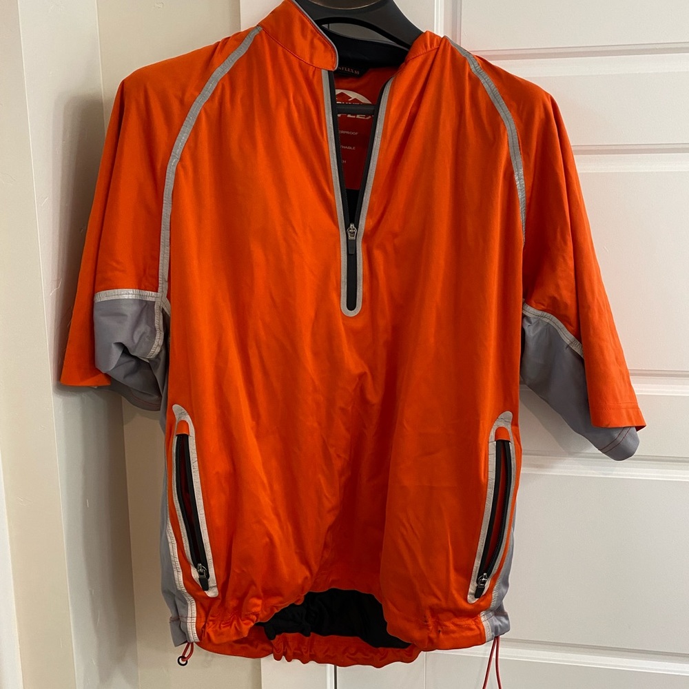 Sun mountain half sleeve rain flex half zip golf jacket.